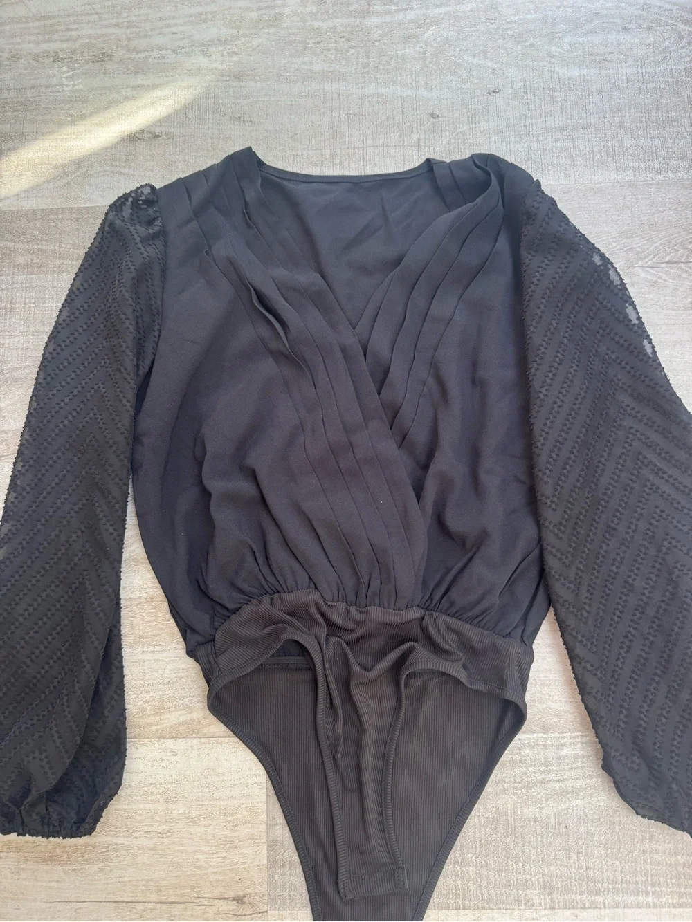 Black Long-Sleeve women's One-Piece Bodysuit size small